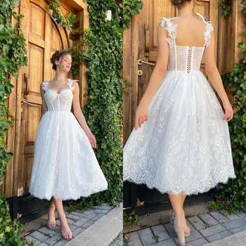 Вечернее платье Элегантное белое кружевное платье с вырезом сердечком и пышной юбкой без рукавов